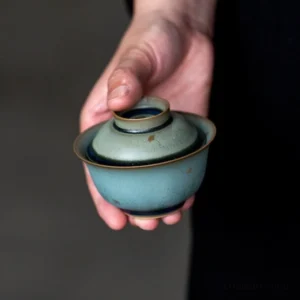3oz handcrafted celadon porcelain gaiwan with gold speckles main view