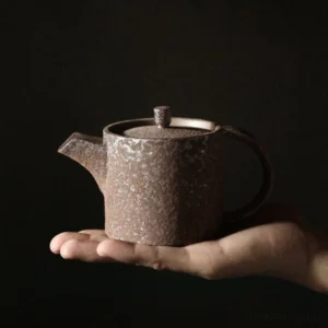 Full side view of handcrafted 7oz iron rust glaze ceramic teapot