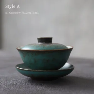 Antique Style A 3.4oz blue-green porcelain gaiwan with gold rim, three-quarter view
