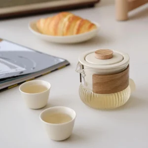 Beige portable travel chawan tea set with carrying case open showing all components