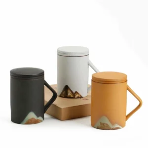 black ceramic tea mug with strainer lid and mountain landscape, matte finish full view