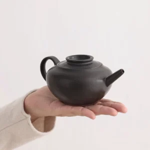 Handcrafted 7oz black ceramic teapot with built-in infuser full product view