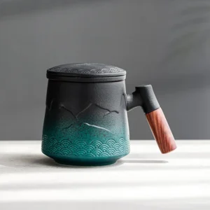 black green gradient ceramic tea mug with lid strainer wooden handle relief mountain pattern