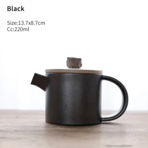 Black matte porcelain side handle teapot with unique stone lid knob