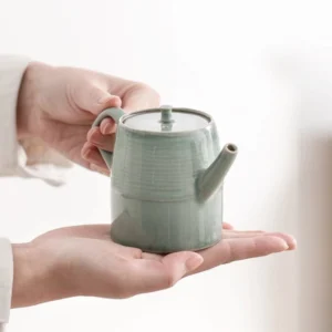full view of handcrafted celadon porcelain teapot 6oz with built-in filter