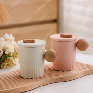 ceramic tea mug with infuser lid and wood handle beige full view