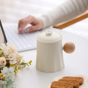 15oz handcrafted ceramic tea mug with infuser and lid beige side view