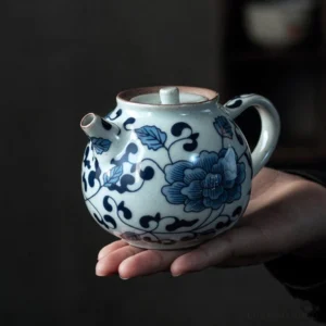 full view of small hand-painted Chinese blue and white porcelain teapot 5oz with peony pattern