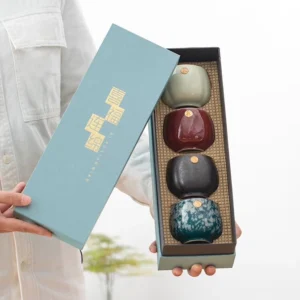 Set of four mixed color Chinese ceramic tea cups with blue gift box