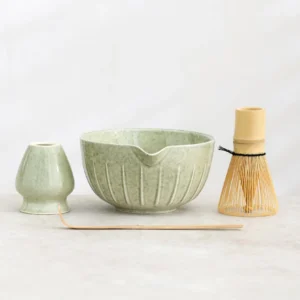 complete 4-piece light green matcha chawan tea set with bamboo whisk spoon and ceramic holder