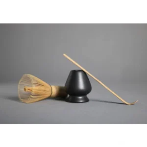 Complete 3 piece matcha preparation kit with chasen bamboo whisk, ceramic naoshi chasen holder, and bamboo chashaku scoop