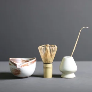 Complete traditional matcha chawan set with matcha bowl, bamboo whisk, chasen holder and bamboo matcha spoon