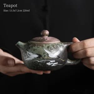 Handheld 7.4oz crane kiln transformation porcelain teapot with red crowned crane pattern