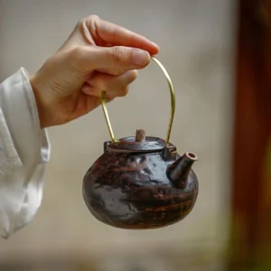 Full set of rustic handmade black ceramic teapot and tea warmer with gold metal handle