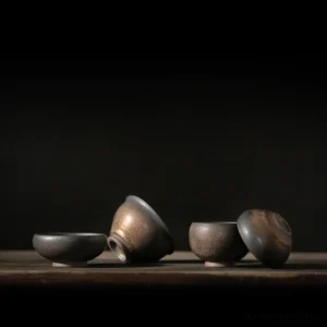 Full set of four sizes handcrafted gilded rough ceramic Chinese tea bowls on bamboo tea tray