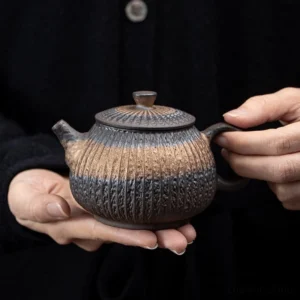 Full view of handcrafted gilded iron glaze porcelain teapot 8.5oz