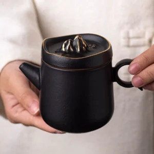 gilded mountain peak black porcelain teapot full product view