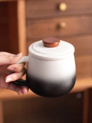 Gradient ceramic tea mug with built-in ceramic strainer and wood lid knob product main view