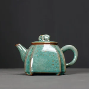 Green gold speckled elephant knob porcelain teapot 8.8oz front view