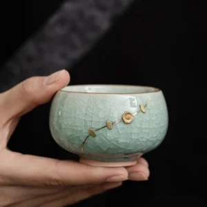 Hand-decorated 2.5oz 3oz ice crackle Chinese nailed tea bowl with golden motifs
