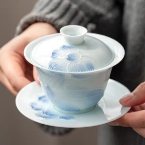 Full view of hand-painted blue lotus white porcelain gaiwan 5oz with lid bowl and saucer