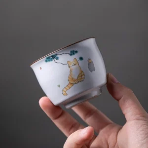 Group display of multiple patterned hand-painted Chinese tea ceremony cups