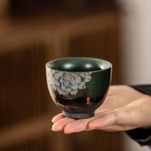 Hand-painted gold trace lotus Japanese ceramic tea cup main view
