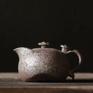 Full view of 7.4oz handcrafted iron rust glaze porcelain teapot