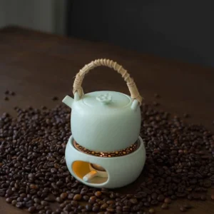 Handcrafted porcelain teapot ceramic candle warming stove set overall view