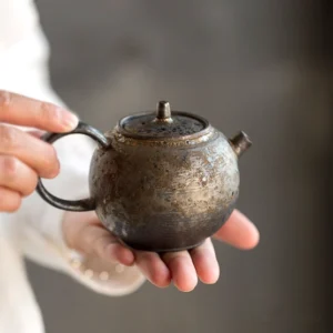 full view of handcrafted textured 7oz porcelain teapot