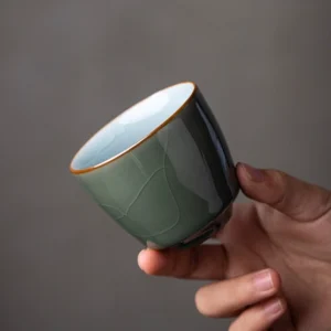 collection of different colored handmade chinese crackle glaze porcelain tea cups