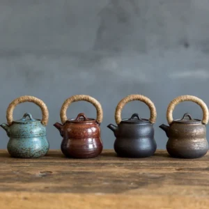 Full side view of handmade gourd shape porcelain teapot with hemp handle