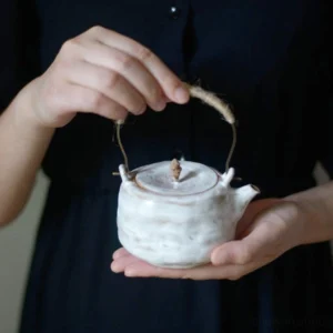 Handmade 9oz Japanese Wabi-Sabi porcelain teapot, jute wrapped metal handle
