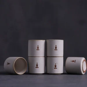 Handmade porcelain Japanese Zen tea cup speckled matte finish with brown rim