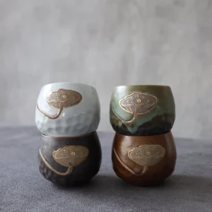 Handmade embossed porcelain lotus seed pod tea cup product main view