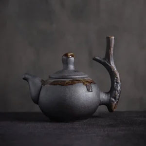 Full side view of Japanese handcrafted branch handle black clay teapot 8oz