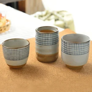 full collection of handmade japanese blue grid ceramic tea cups