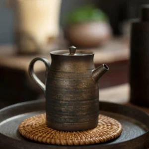 full side view of japanese iron rust glaze small porcelain teapot 6oz