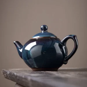 Handcrafted Jian Zhan Porcelain Teapot 7.8oz deep blue kiln change glaze side view