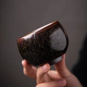 Handmade starry glaze black Jianzhan tea bowl side view