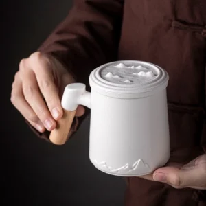 Mountain relief ceramic tea infuser mug with wooden handle full product view