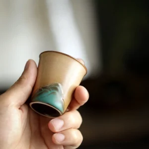 1.5oz hand carved mountain relief porcelain tea cup side profile