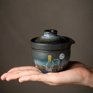 Portable ceramic chawan travel tea set complete with gaiwan teacup and travel bag