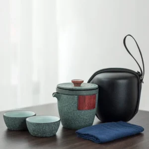 Full set of portable ceramic chawan travel tea set with black carrying case open