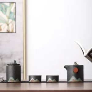 portable ceramic travel tea set with mountain sun design full view