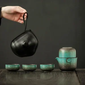 Full open view of complete portable ceramic chawan travel tea set with all pieces