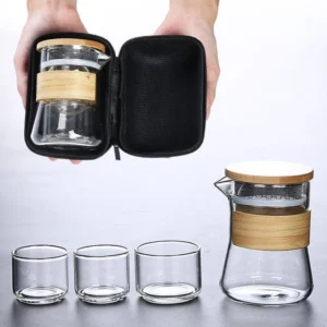 Full portable glass travel tea set with teapot, cups, and black carry bag