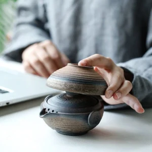 Portable rough pottery travel chawan set fully nested for storage