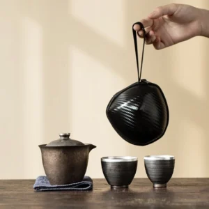 full portable retro ceramic travel chawan tea set with silver accents and black carry bag