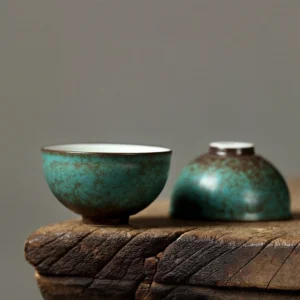 Side view of retro green textured handcrafted Chinese ceramic tea bowl 1.7oz
